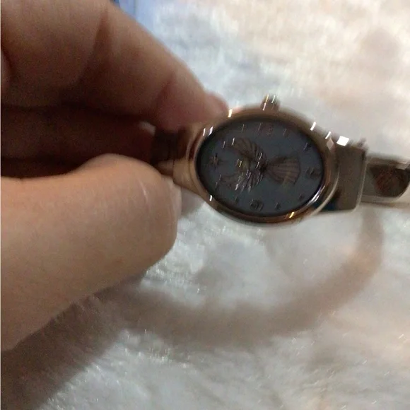 Guragian angel motif cuff watch by Avon - Picture 2 of 5